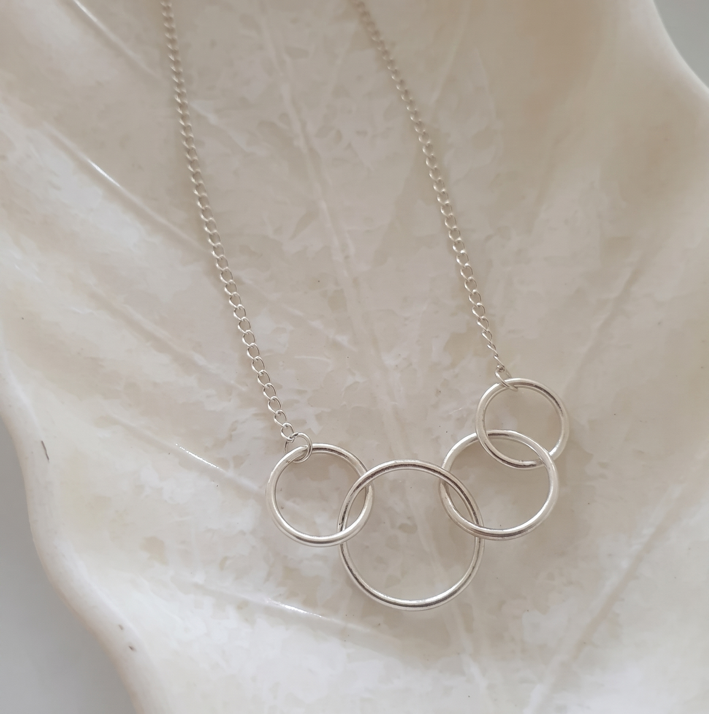 Silver Finish Four Linked Circle Necklace