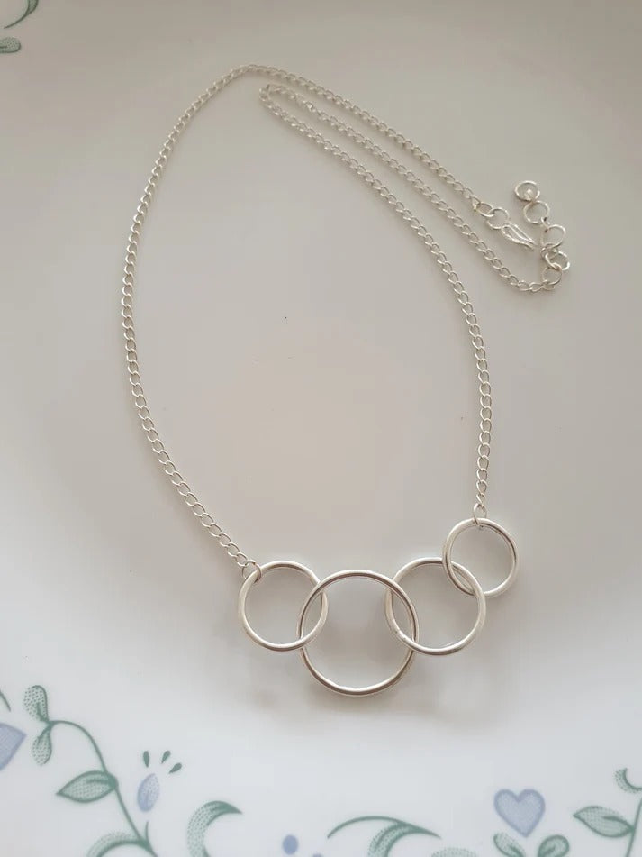 Silver Finish Four Linked Circle Necklace